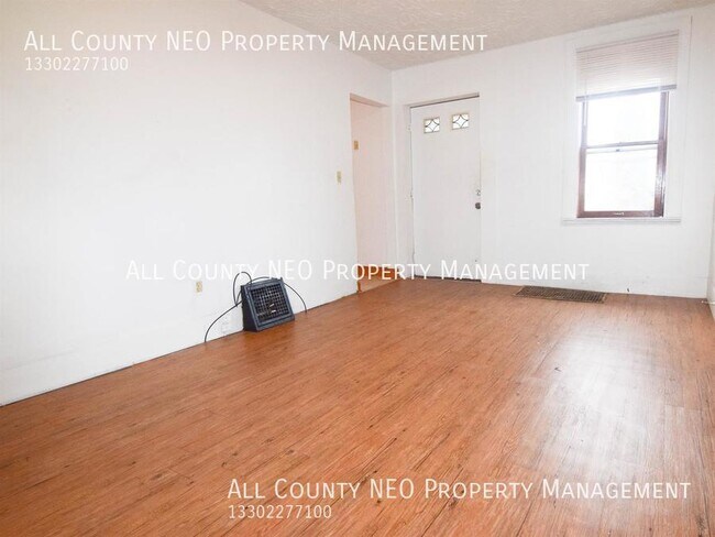 Building Photo - 1 bed, 1 bath single family home in Akron