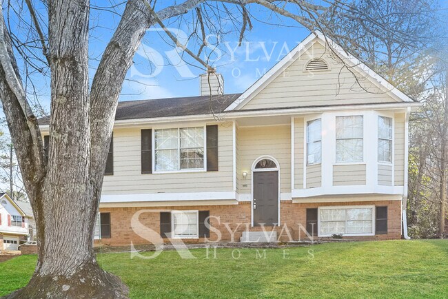 Building Photo - Welcome to this exquisite 5-bedroom, 2 spl...