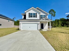 Building Photo - 702 Abode Ave