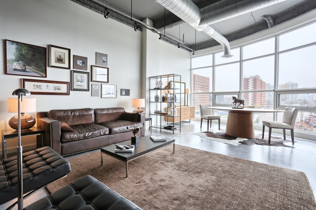 Light floods the living room in this gorgeous apartment - The 1500 Condominium