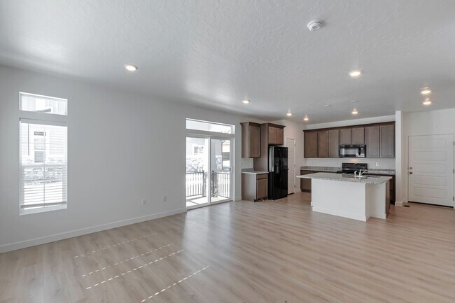 Building Photo - Like New Lehi Row End Townhouse w 2 car at...