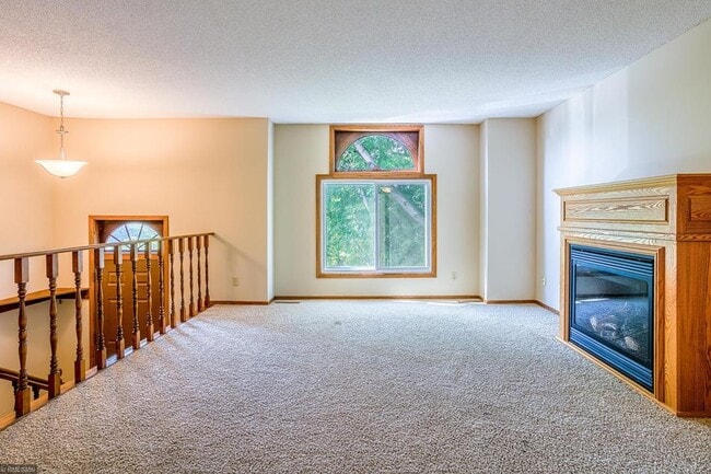 Building Photo - 9241 Upland Ln N