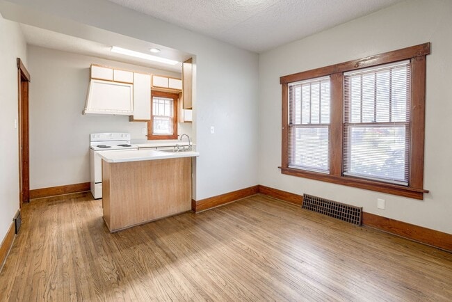 Building Photo - Charming 2 Bed Home | Hardwood Floors | Huge Basement | Small Dog Friendly