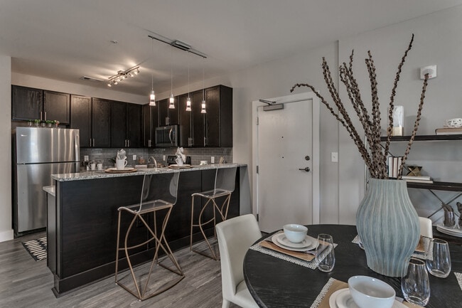 Modern Kitchen with Wood Floors & Stainless Steel Appliances - Flats on 4th Apartments