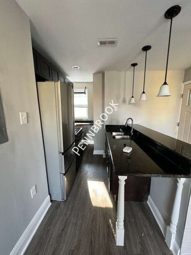 Foto del edificio - Modern 2 Bed/1 Bath Bi-Level