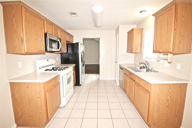 Building Photo - 5727 Rose Rock Canyon Dr
