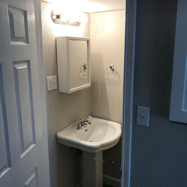 Half bath downstairs - 1125 Bilbo St