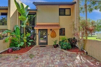 Building Photo - 700 E Coco Plum Cir