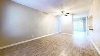 This 850 square foot apartment in Nashville, TN offers a practical and modern living space. The single-floor layout comprises three bedrooms, including a spacious 190 square foot primary bedroom, one bathroom, and an open-concept kitchen and living area. The kitchen stands out with its updated design, featuring white cabinetry, granite countertops, and stainless steel appliances. The galley-style layout maximizes efficiency while providing ample counter space.

Throughout the apartment, a mix of flooring types adds character. The kitchen and living areas boast attractive hardwood floors, while the bedrooms are carpeted for comfort. Ceiling fans in multiple rooms offer improved air circulation and ambient lighting. Large windows in the bedrooms and living area allow for natural light, enhancing the sense of space.

The bathroom, while not expansive, appears clean and functional with a standard tub-shower combination. Storage solutions include built-in closets in the bedrooms and additional shelving in the hallway. The neutral color palette throughout provides a blank canvas for personal decorating styles.

Despite its compact size, the apartment's layout feels open and uncluttered. The efficient use of space makes this 3-bedroom unit an attractive option for small families or those seeking extra rooms for home offices or guests. Located in the Pebble Creek Circle area of Nashville, this apartment combines practicality with modern amenities in a desirable location.