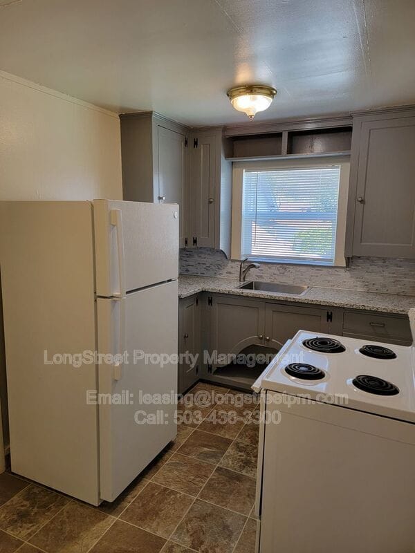 Building Photo - 205 NW Kings Blvd