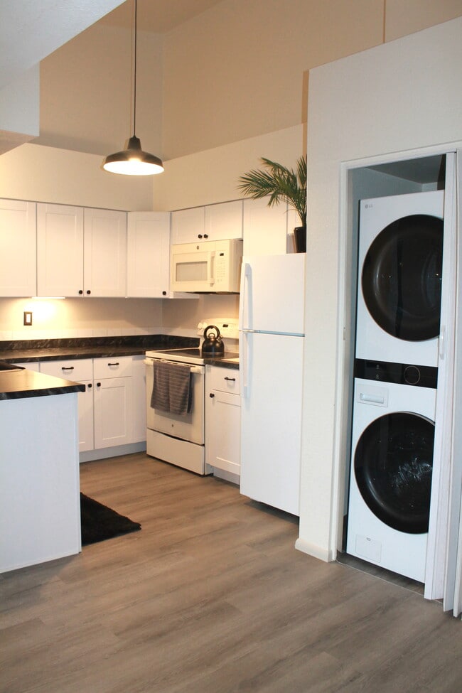 New Kitchen, with New washer/dryer in laundry closet - 2188 N Pantano Rd