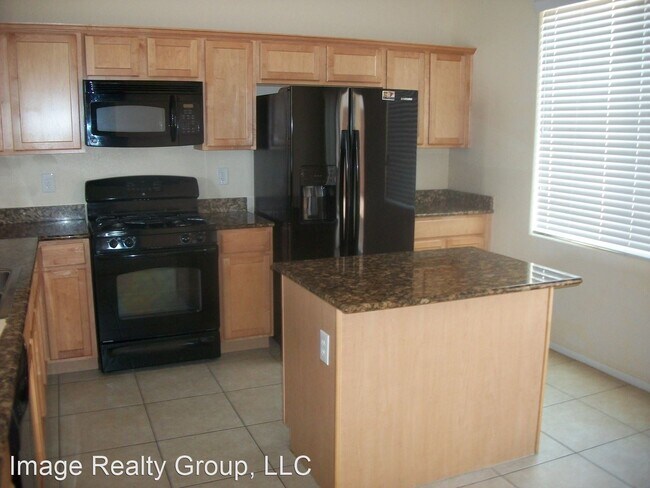 Building Photo - 3 br, 2.5 bath House - 8367 Gourley Ave.