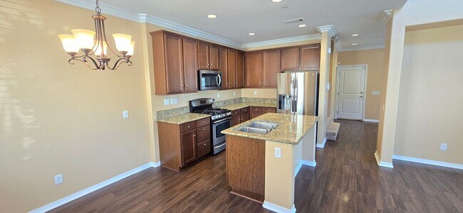 Building Photo - Beautifully maintained 2-bedroom, 2.5-bath with Loft • 1,504 sqft & 2-car garage.