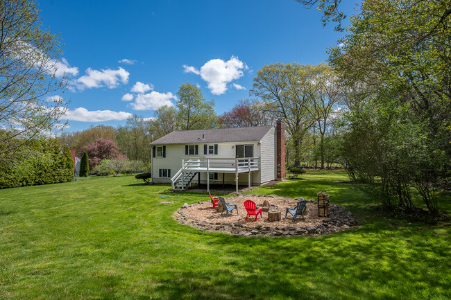 Backyard fire pit and deck - 52 Putnam Hill Rd