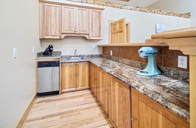 Custom bar with sink and dishwasher - 100 Thomas Rd