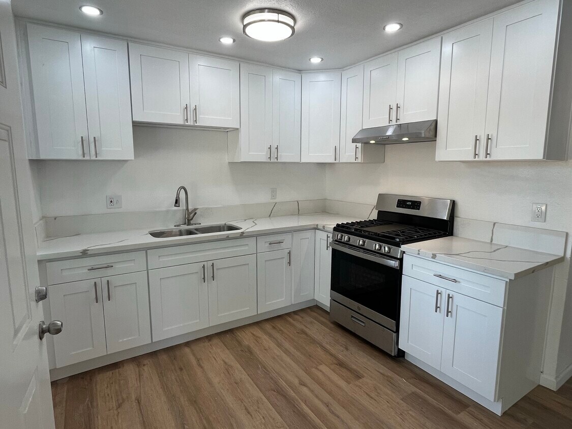 New cabinets, stainless steel applliances, and sky lights - 2519 S Rowell Ave