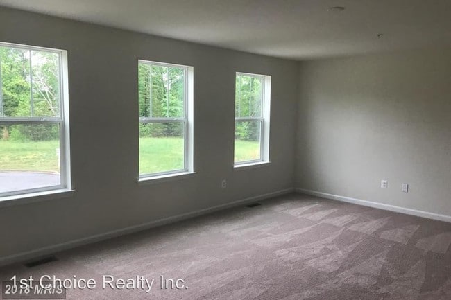Building Photo - 4 br, 2.5 bath House - 1404 Woodmead Ct