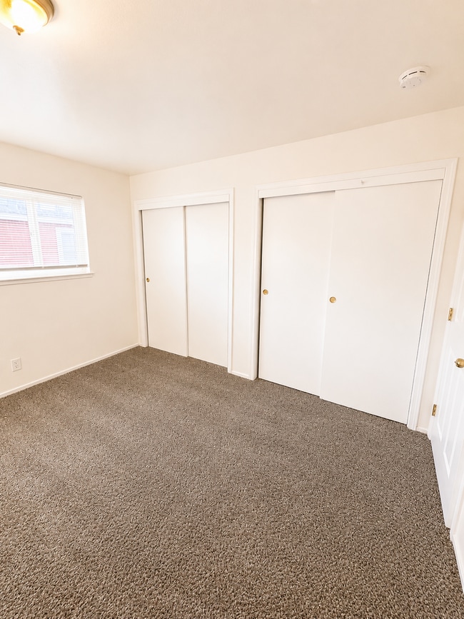 Photo - $1575 Moves You In - No Rent Due For August 2026    Updated interior - must see! Parking On Site ... Apartment