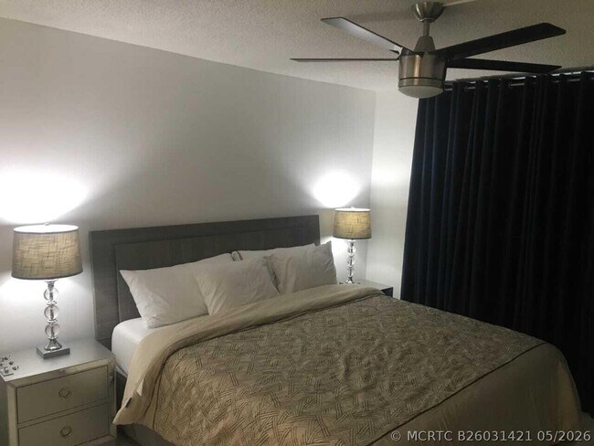 Foto del edificio - 9091 Lime Bay Blvd