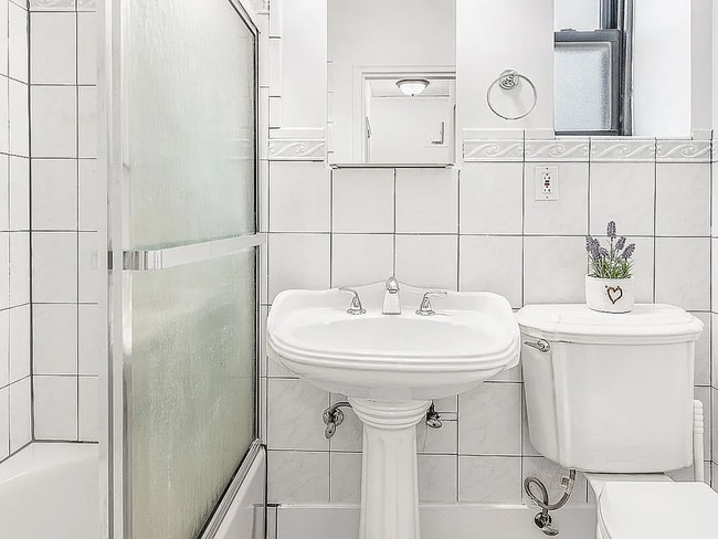 Building Photo - 21-39-39 78th St