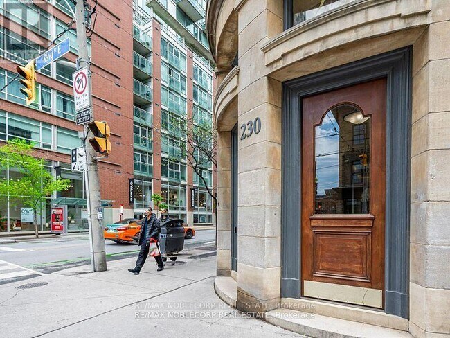 Building Photo - 230-230 King St E