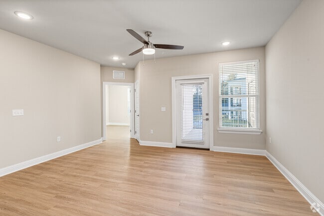 The Cove: 3BR, 2BA - Living Room - Flats at East Bay