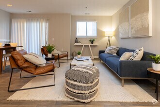 2BR, 2BA - 1,050SF - Living Room - ReNew Belcamp