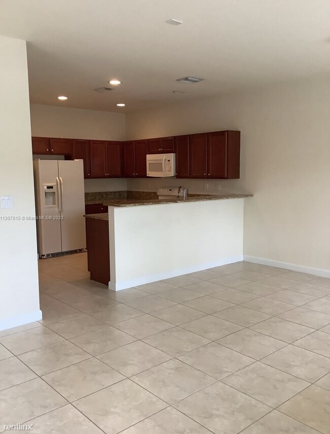 Building Photo - 3 br, 2.5 bath House - 8879 SW 227th Ter