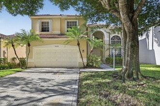 Building Photo - 6468 NW 78th Pl