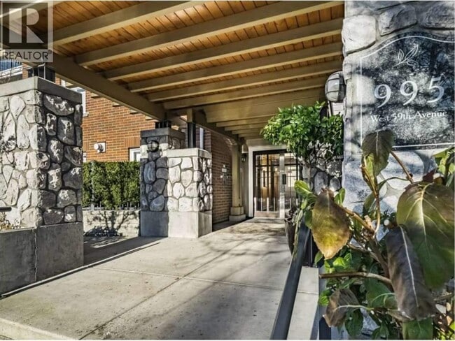 Building Photo - 995 W 59th Ave