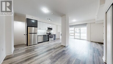 Building Photo - 57 Finch Ave W