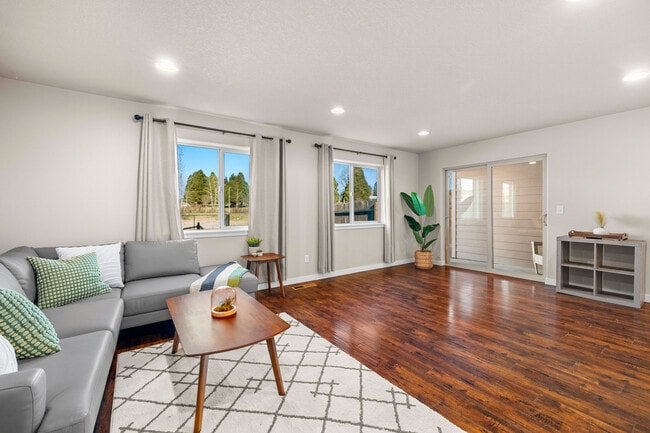 Living room, dining room, slider to back patio - 108 NE 14th St