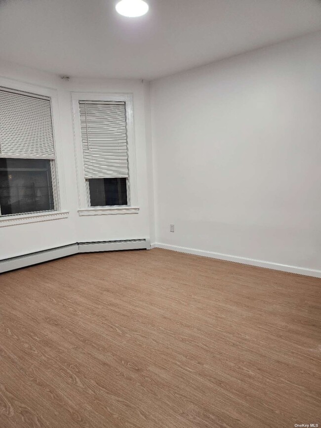 Building Photo - 124-13-124-22 22nd Ave