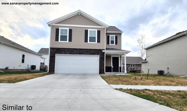 Building Photo - "Modern Luxury: Spacious 4-Bedroom Home with Open-Concept Design"