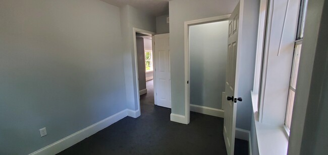 Bedroom 1. Closet has Built-in Light - 309 E 7th St