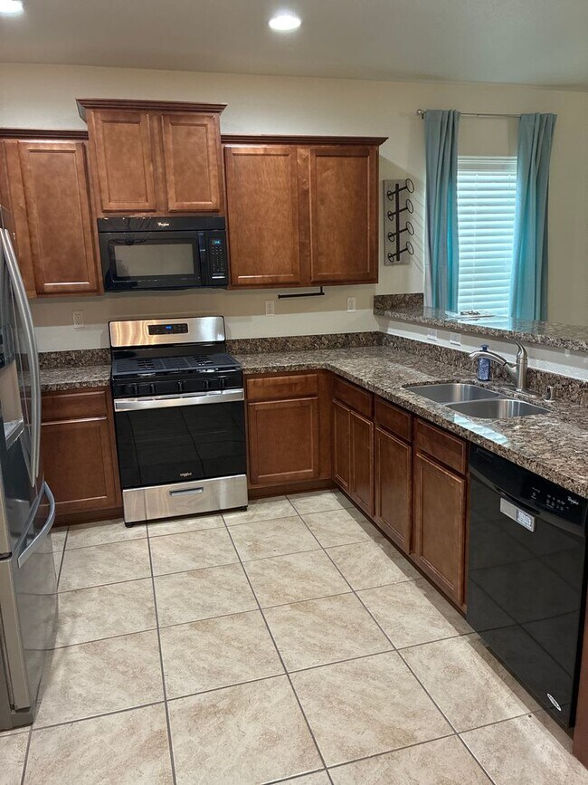 Building Photo - Nice clean three bedroom two bath home