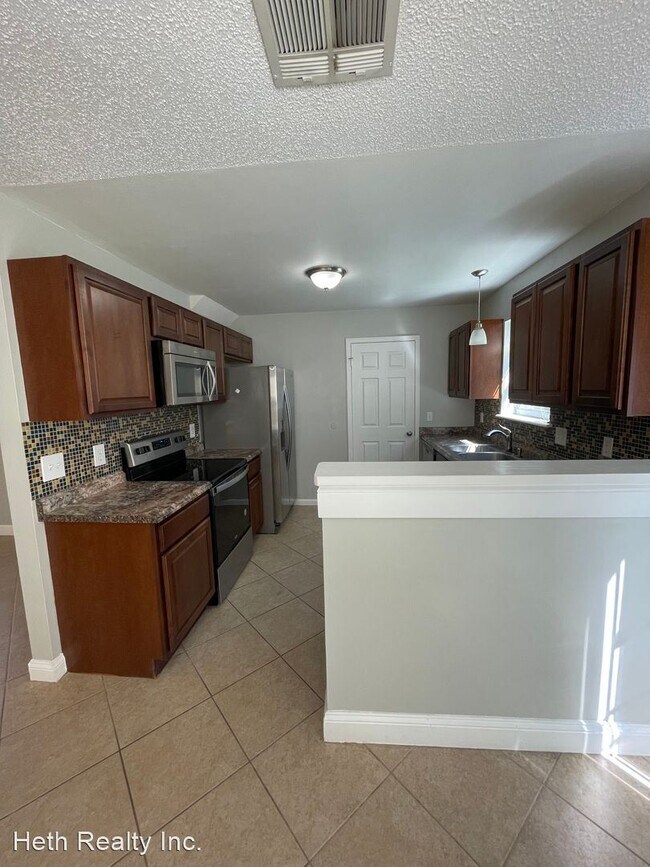 Foto del edificio - 3 br, 2 bath House - 7769 Allspice East Ci...