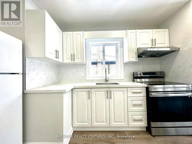 Building Photo - 65 Miramar Crescent