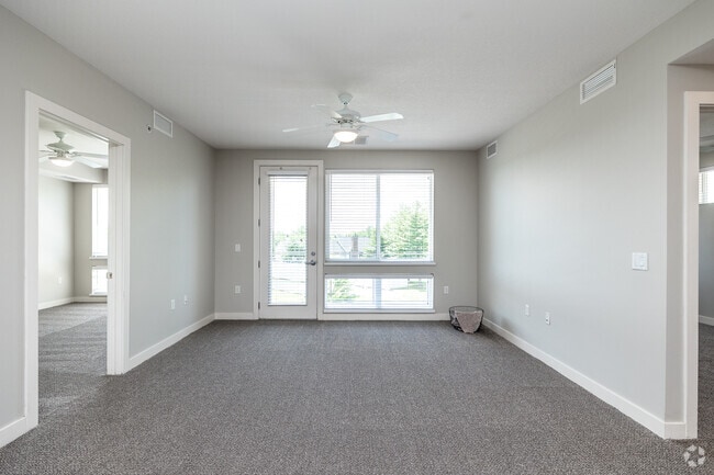 2BR, 2BA - 1,178 SF - Stonecrest - Living Room - Residences at 62W