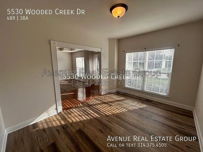 Building Photo - 5530 Wooded Creek Dr
