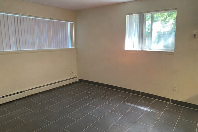 Sala de estar - Brown Street Apartments