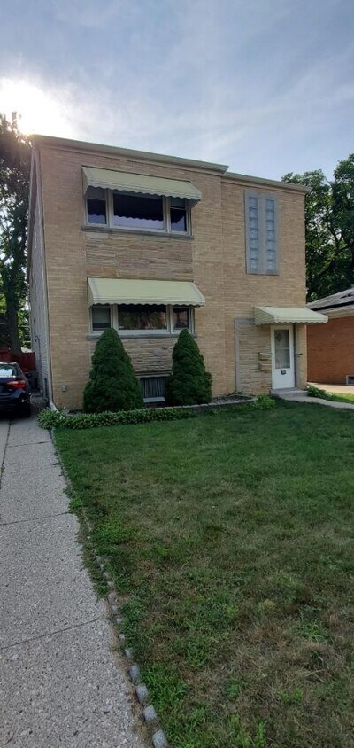 Front of Building w/ Driveway Parking - 509 Asbury Ave