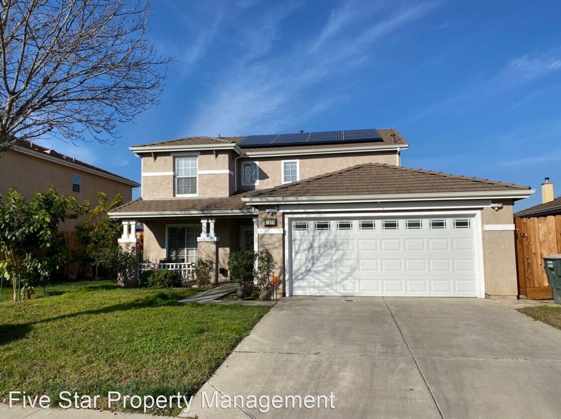 Foto principal - 4 br, 2.5 bath House - 2029 Floral Ct