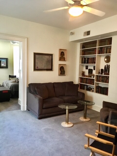 Living area with bookcases - 1120 Saint Gregory St