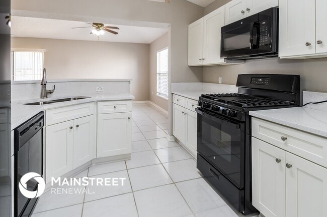 Building Photo - 7360 Lawn Tennis Ln