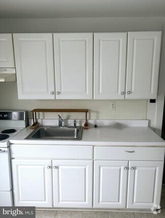 Building Photo - 213-219 N Delsea Dr