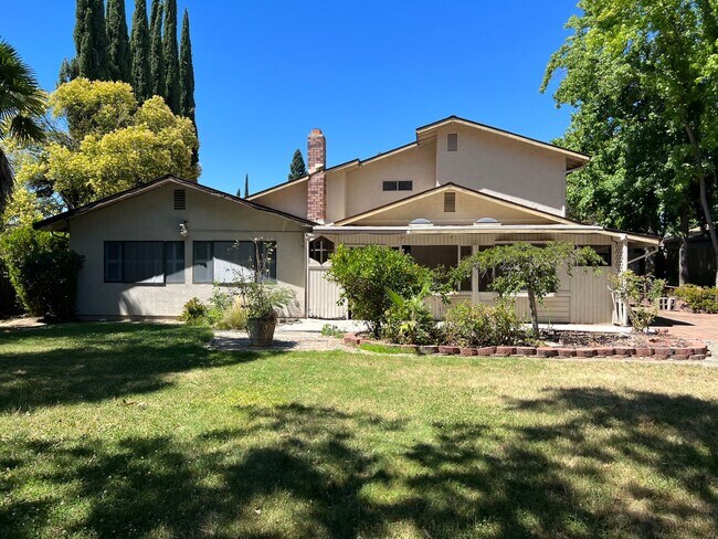 Building Photo - Spacious Four Bedroom Three Bathroom Home