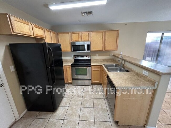 Building Photo - 12923 W Peppertree Ln