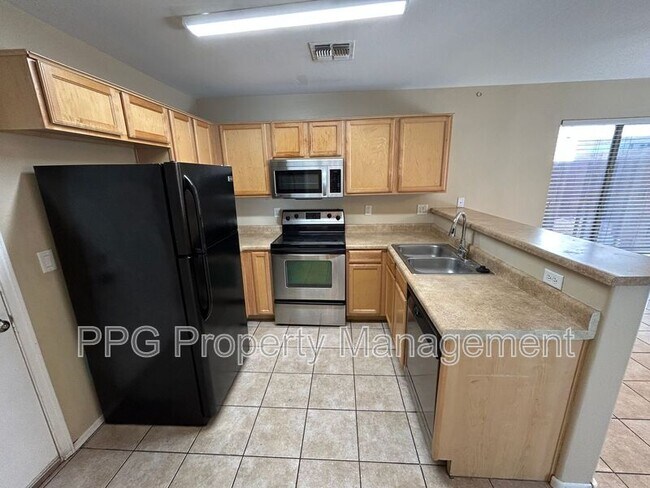 Foto del edificio - 12923 W Peppertree Ln