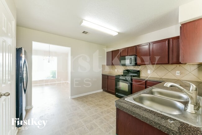 Building Photo - 9909 Hyacinth Way